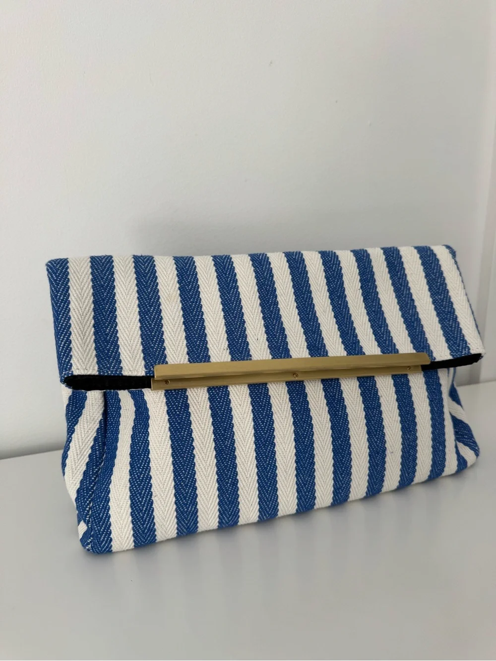 ASOS Blue and White Striped Fold-Over Clutch with Gold Bar